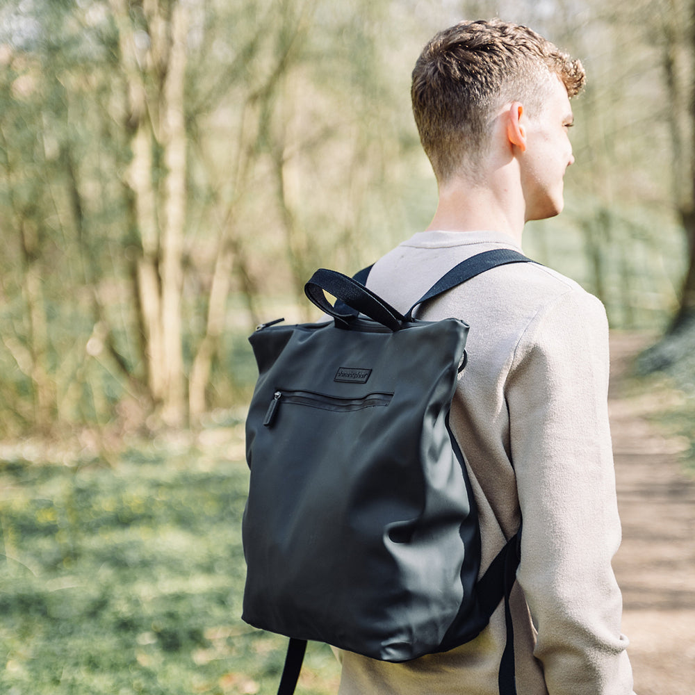 7003560-done-by-deer-45cm-changing-backpack-w-change-mat-black