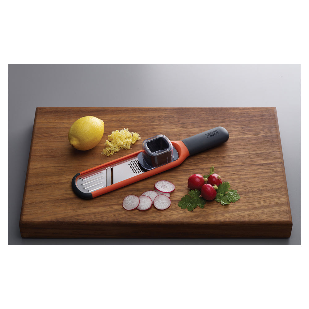 20048-joseph-joseph-handi-grate-2-in-1-mini-grater-and-slicer-orange