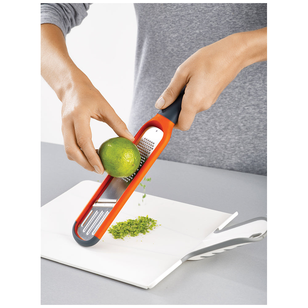 20048-joseph-joseph-handi-grate-2-in-1-mini-grater-and-slicer-orange