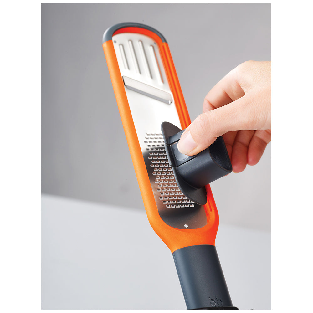 20048-joseph-joseph-handi-grate-2-in-1-mini-grater-and-slicer-orange