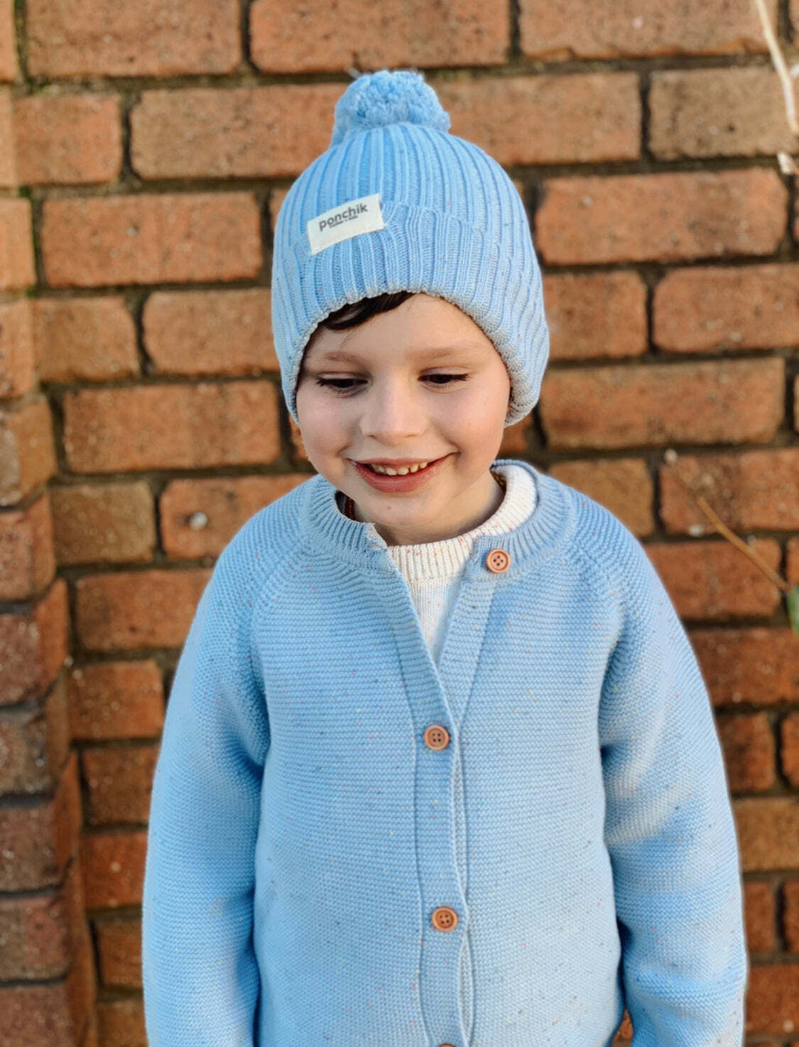 11100334-ponchik-baby-toddler-pom-pom-ribbed-beanie-mist-speckle-knit-size-3-6m