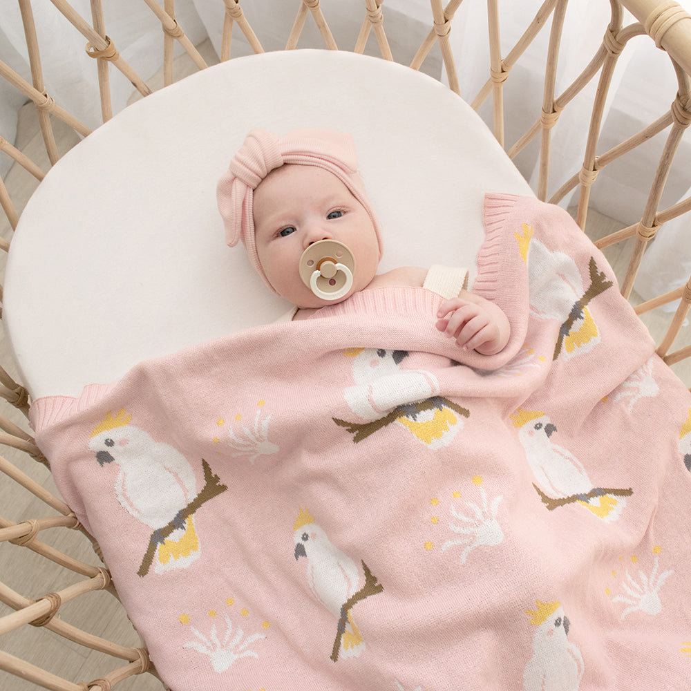 4323002-living-textiles-australiana-85cm-cotton-baby-blanket-cockatoo-blush