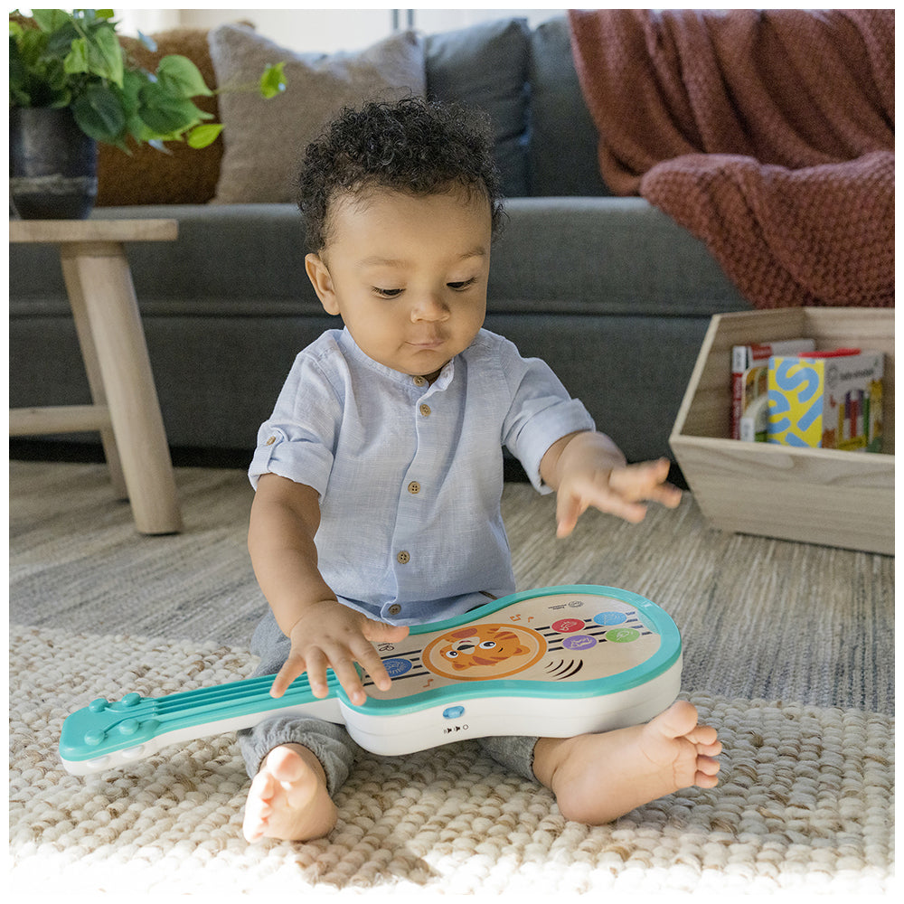 12609-baby-einstein-be-hape-sing-and-strum-magic-touch-ukulele