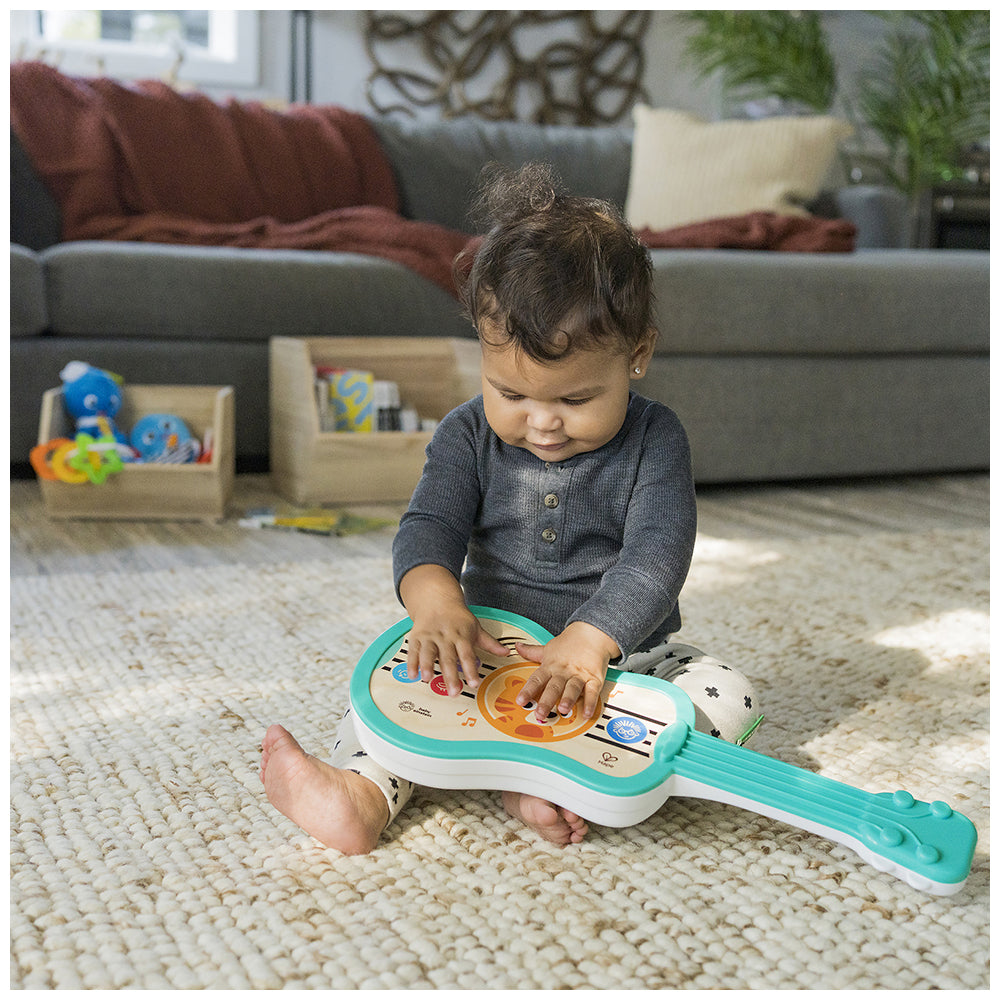 12609-baby-einstein-be-hape-sing-and-strum-magic-touch-ukulele