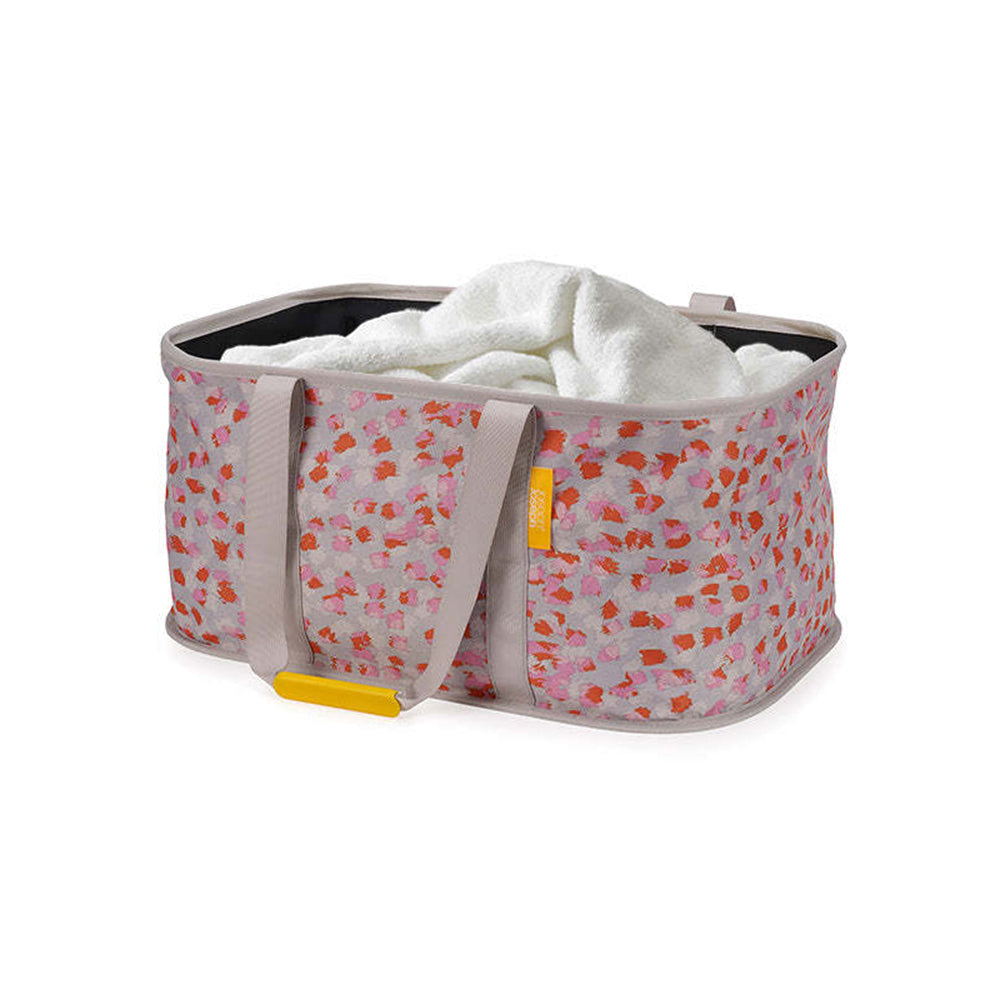 50038-joseph-joseph-hold-all-max-53cm-35l-laundry-basket-peach-blossom