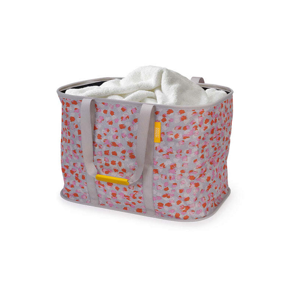 50040-joseph-joseph-hold-all-max-53cm-55l-laundry-basket-peach-blossom